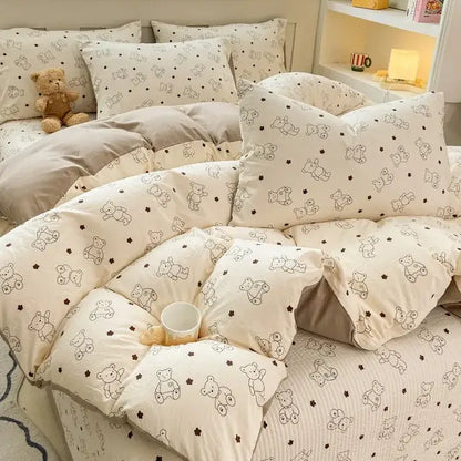 Cream-colored cotton duvet cover set with plush texture featuring black teddy bear silhouettes and small stars