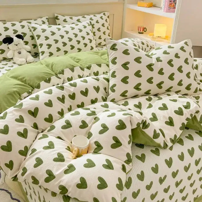 Green heart-patterned duvet cover set with white base and soft plush fabric for cozy bedroom bedding use