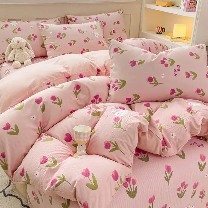 Pink tulip-patterned cotton duvet cover set with soft plush fabric and subtle green stems for bedroom bedding
