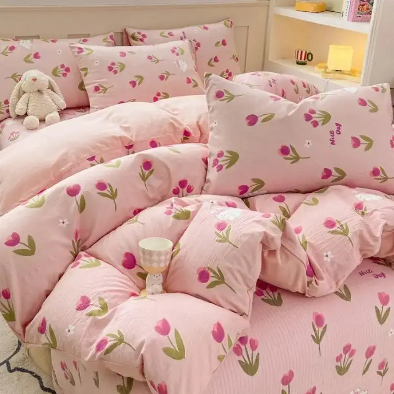 Pink floral cotton duvet cover set with tulip and leaf patterns in soft pastel tones for bedroom bedding