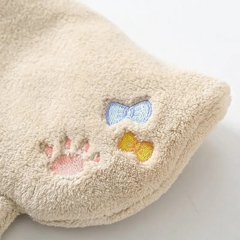 Beige plush cartoon cat hand towel with embroidered pink paw print and colorful bows for kitchen cleaning decorbites cartoon cat