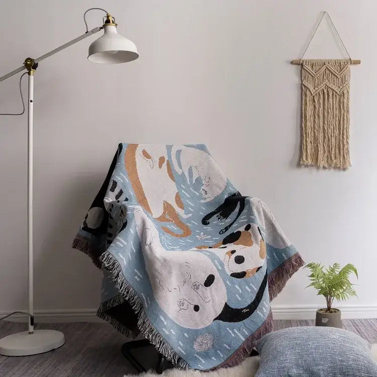 A cozy light blue cat throw blanket with cartoon pandas pattern, soft fringed edges, perfect for teal blue bedroom decorbites cartoon cat