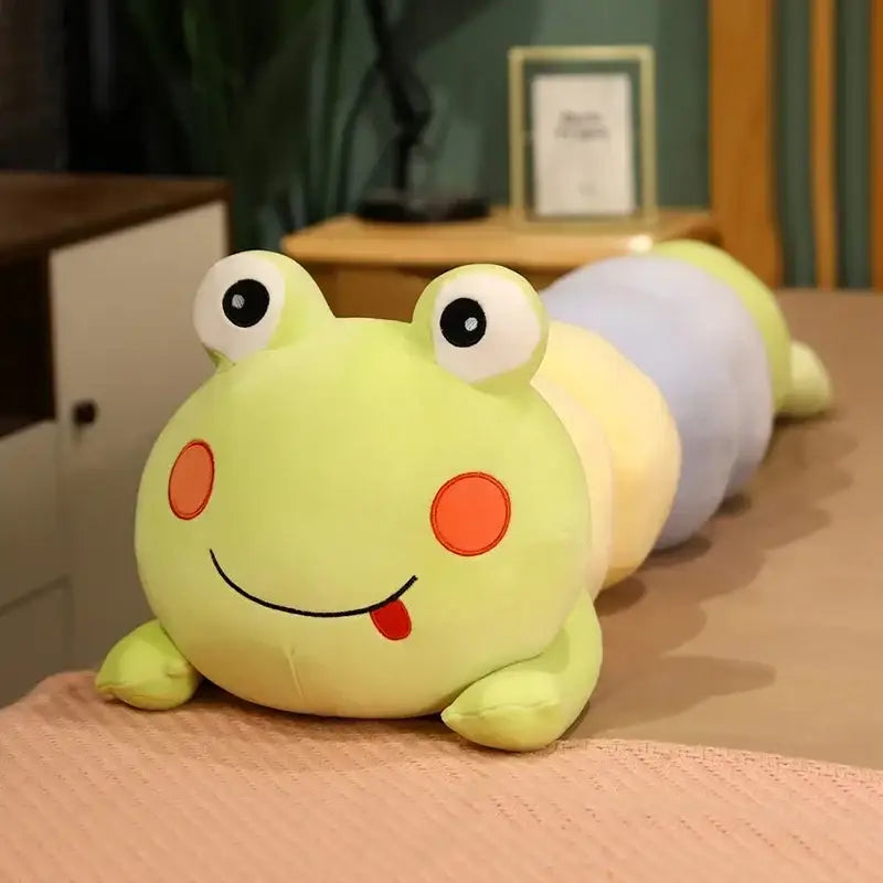 A plush long body pillow featuring a lime-green cartoon caterpillar with orange cheeks and pastel fabric segments