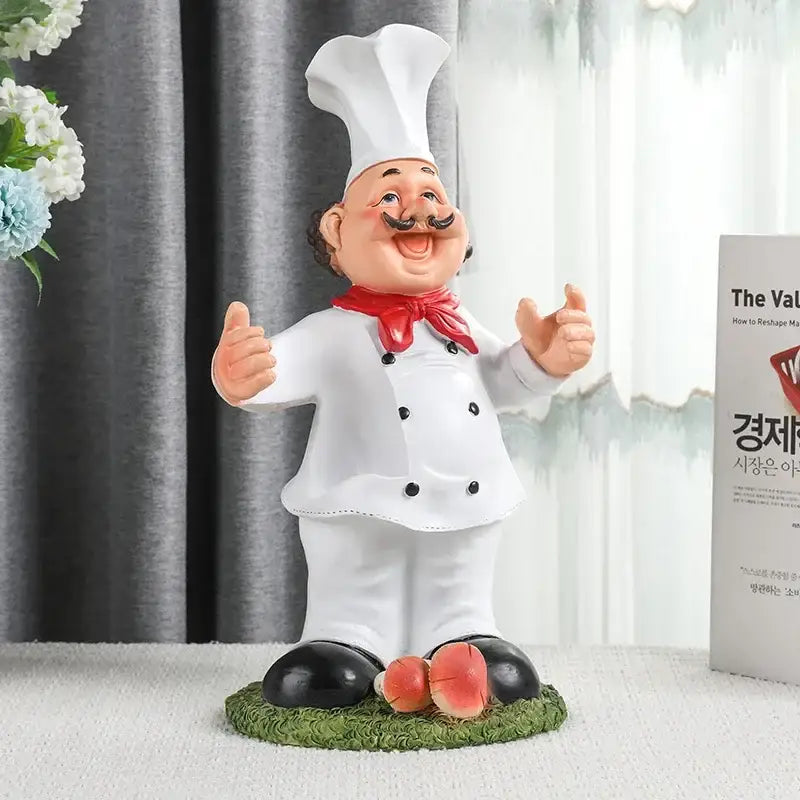 White plastic resin cartoon chef wine rack with red neckerchief and black buttons on green base decorbites cartoon chef