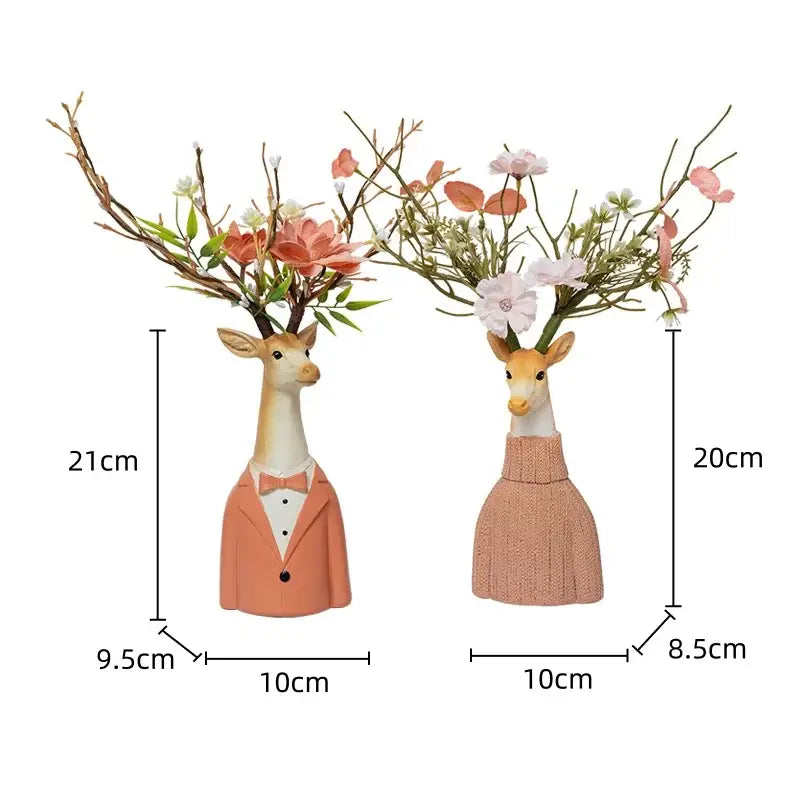 Two whimsical cartoon deer vases in beige and orange resin with floral arrangements for living room decor