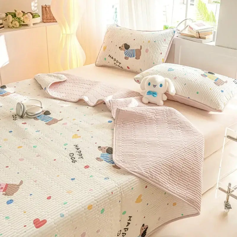 Pastel pink quilted cotton bed cover set featuring a playful happy dog pattern with hearts and colorful polka dots
