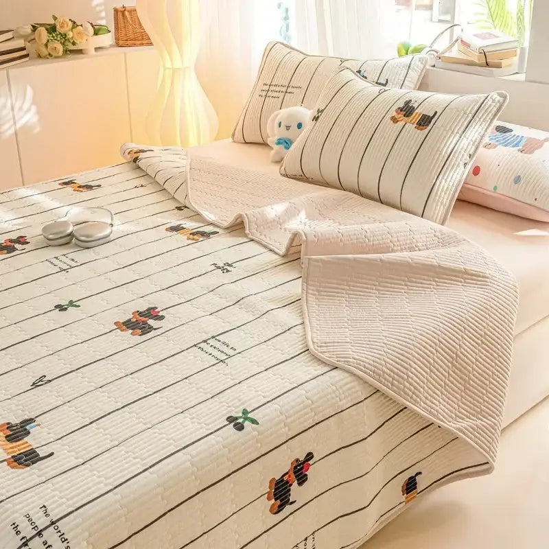 Cream-colored quilted cotton bed cover set with playful cartoon dachshund prints and black vertical stripes