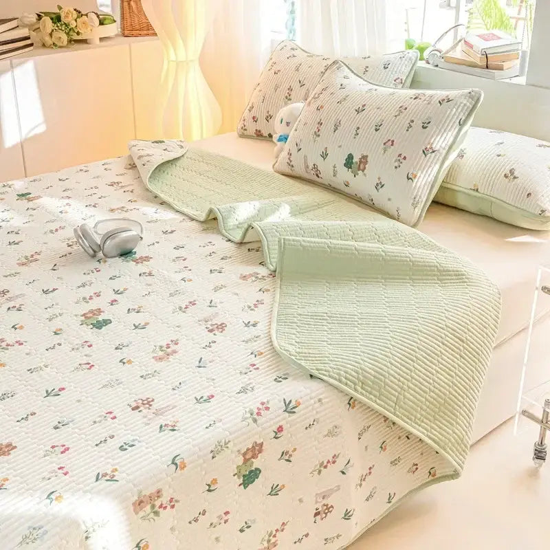 Light green cotton quilted bed cover set with cartoon dinosaur print and floral pattern for bedroom use