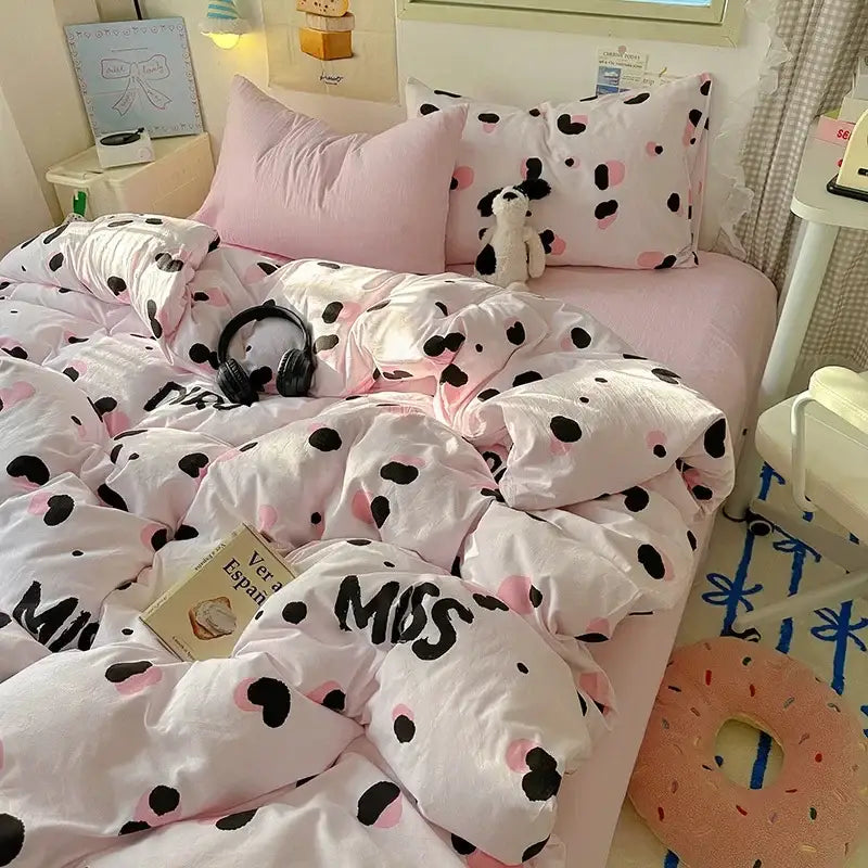Pink and black polka dot duvet set with miss print paired with cartoon dog and cupcake cream cotton fitted sheet set