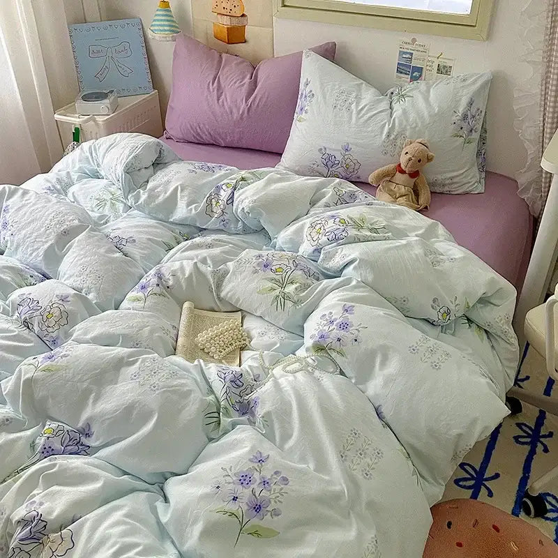 Light blue floral embroidered duvet cover set with soft cotton fitted sheet set featuring cartoon dog and cupcake design