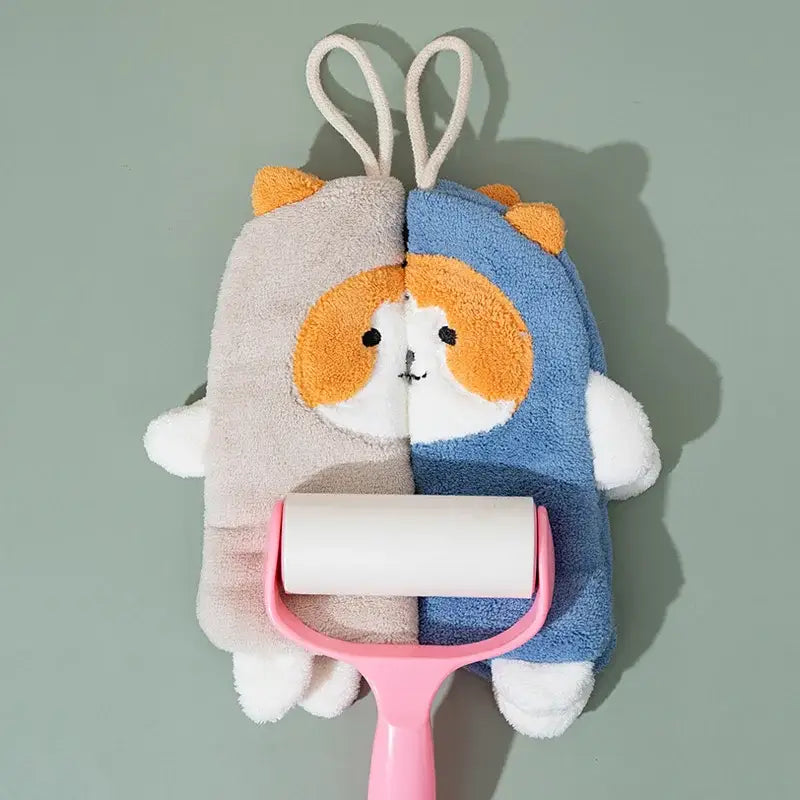 Cute two-toned gray and blue coral velvet hand towel with orange face and white paws featuring decorbites cartoon dog design