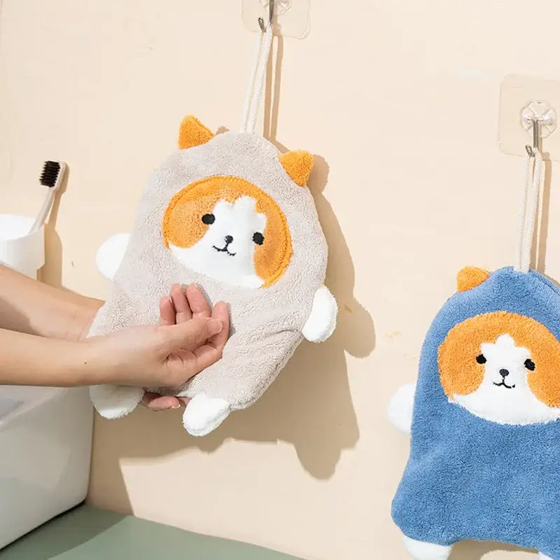 Soft gray plush bath glove with orange and white cat face design hanging, coral velvet hand towels by decorbites cartoon dog