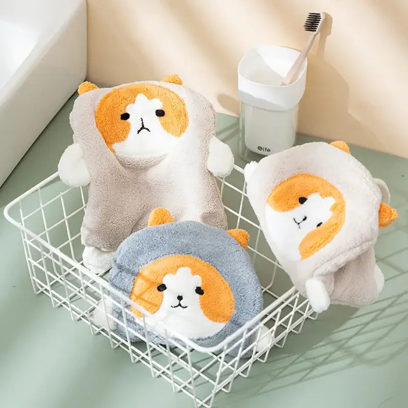 Soft plush cat-shaped hand towels in beige and gray with orange accents made of coral velvet decorbites cartoon dog