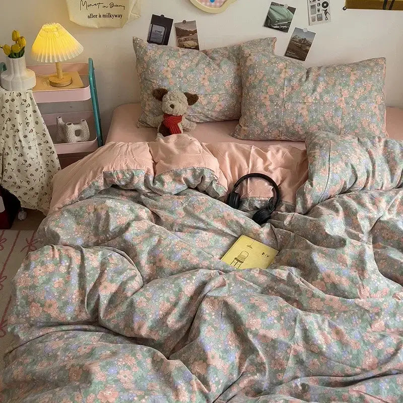 Floral-patterned pastel bedding set in pink green and blue featuring decorbites cartoon style comforter set for bedroom