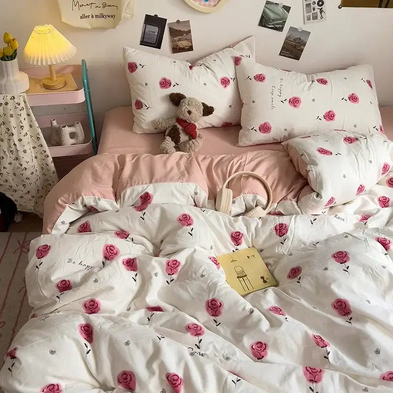 Cream comforter bedding set featuring a white duvet cover with pink rose pattern and subtle gray heart accents decorbites cartoon style