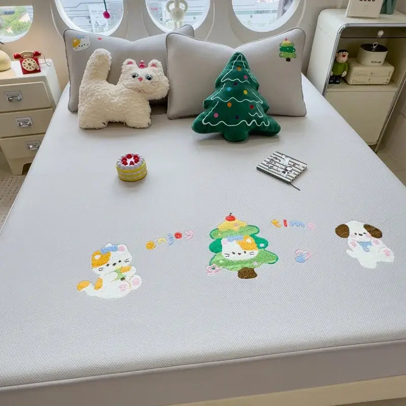 Light gray decorbites cartoon embroidered fitted sheet with textured bed pad featuring colorful cat dog and tree designs