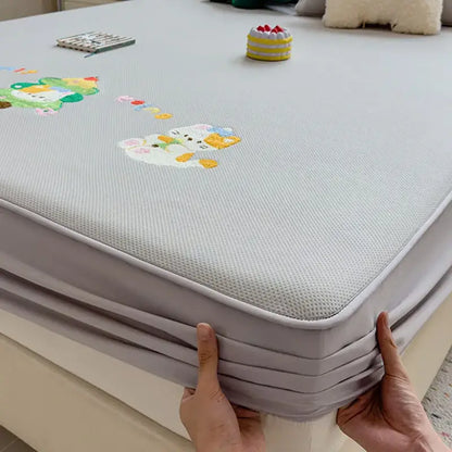 Light gray fitted sheet with decorbites cartoon embroidered mesh bed pad and soft stretchy border for mattress protection