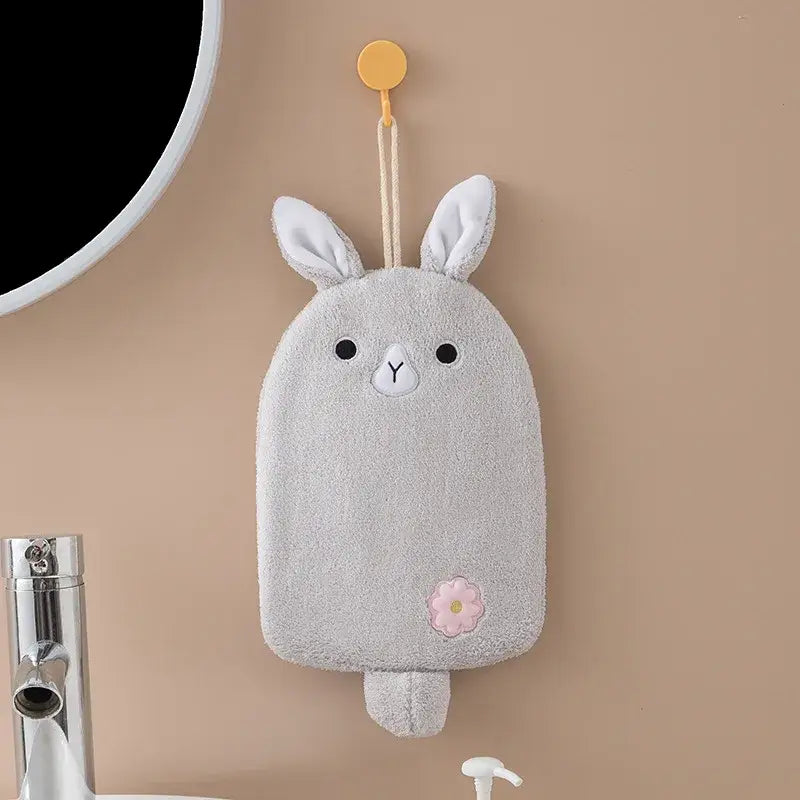 Gray bunny-shaped hand towel with soft terry cloth, embroidered eyes and nose, featuring pink flower patch by decorbites cartoon embroidery hanging design