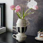 Stacked black and white ceramic folding cup vase with pink tulips decorbites cartoon folding cup for living room decor