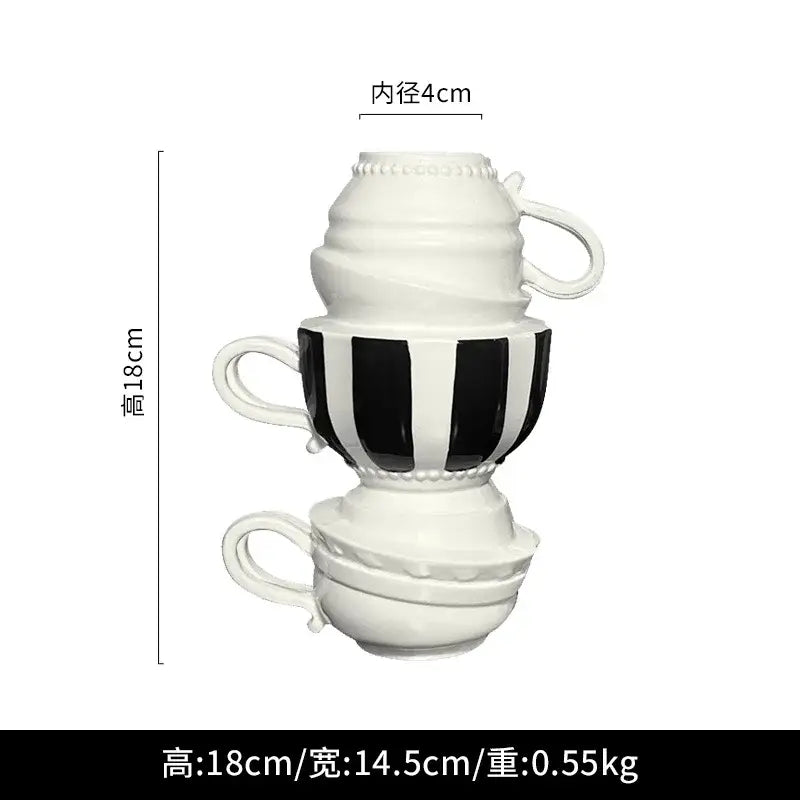 Stacked ceramic folding cups with a bold black and white vertical striped decorbites cartoon folding cup for living room decor
