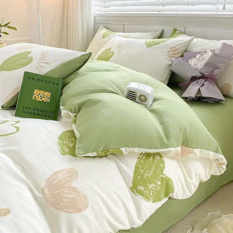 Pastel green and white heart-patterned duvet set with cartoon heart floral design in soft textured fabric