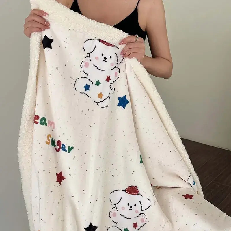 A cream-colored decorbites cartoon lamb wool blanket with embroidered puppies and pink floral sofa cover design