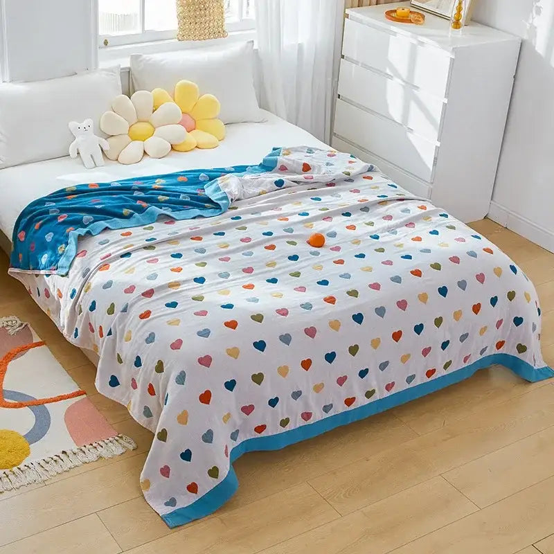 Cozy white cotton throw blanket with multicolored hearts and blue border for decorbites cartoon lion bedroom decor