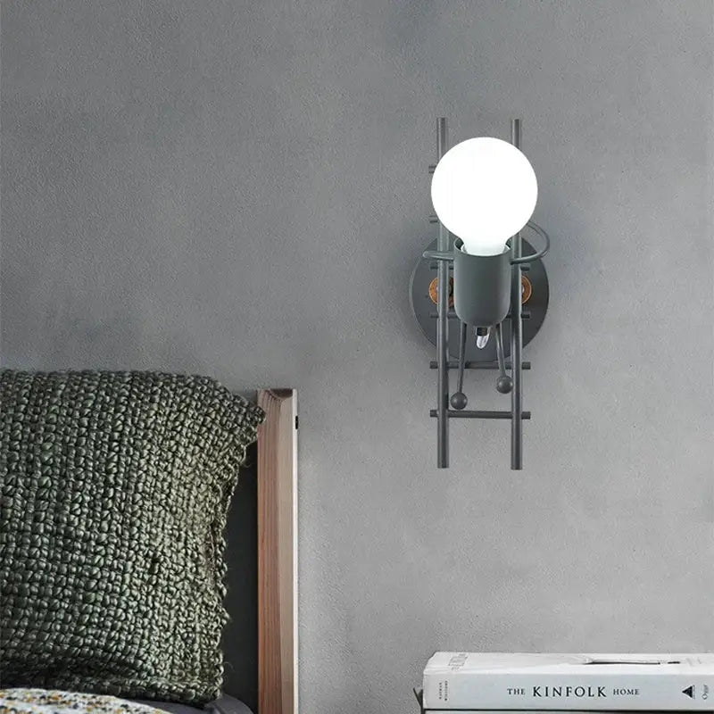 Modern matte black metal wall lamp with frosted glass bulb decorbites cartoon matchstick man for kids room decor