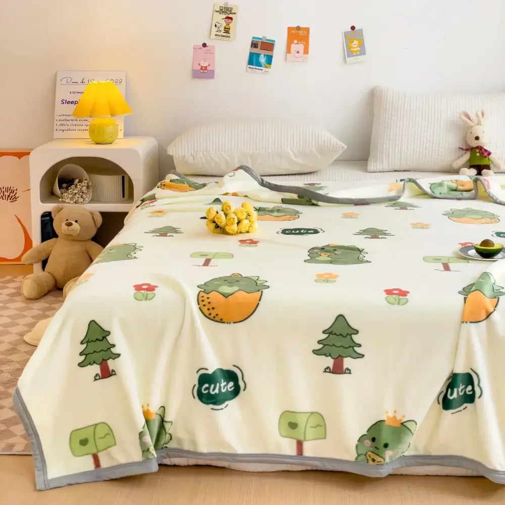 Cream-colored cartoon milk velvet milk velvet blanket with green trees orange fruit characters and teal speech bubbles decorbites cartoon milk