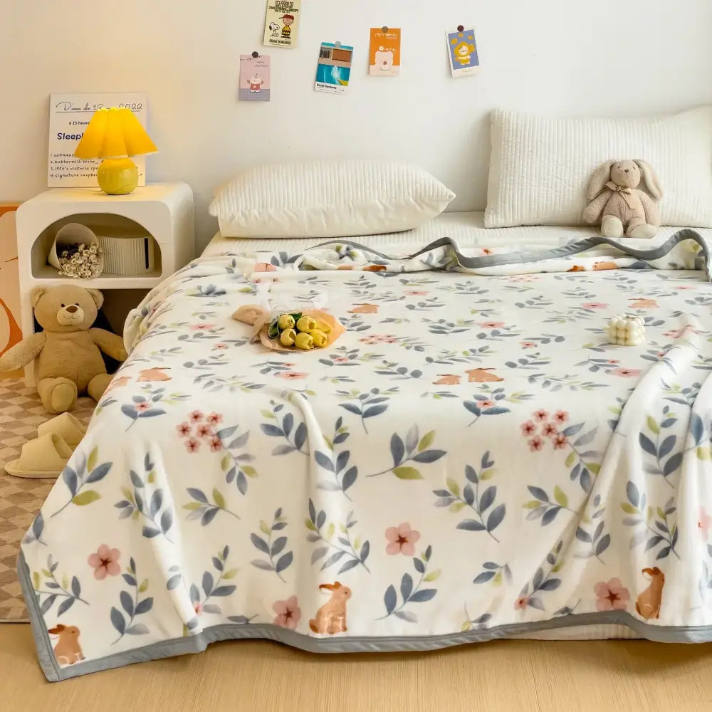 Soft white cartoon milk velvet teddy bear blanket with pastel pink gray green floral and bunny pattern decorbites cartoon milk