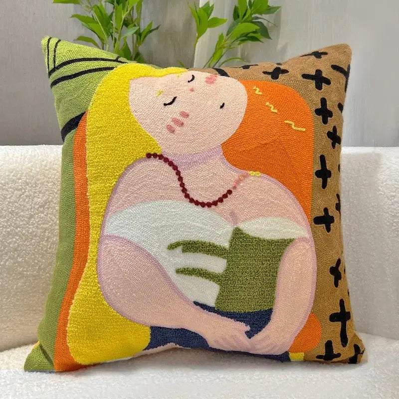 Vibrant oil painting embroidery throw pillow with cartoon oil art of a sleeping woman holding a green book for decorbites cartoon oil