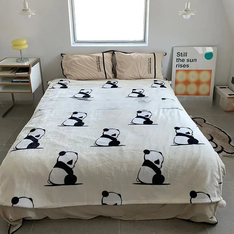 Cream-colored cartoon panda flannel white fleece blanket with pom poms featuring panda flannel double decorbites pattern