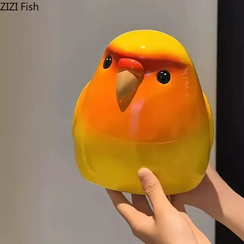 Glossy yellow and orange ceramic bird-shaped tissue box with black eyes and tan beak for decorbites cartoon parrot decorbites cartoon parrot living room decor
