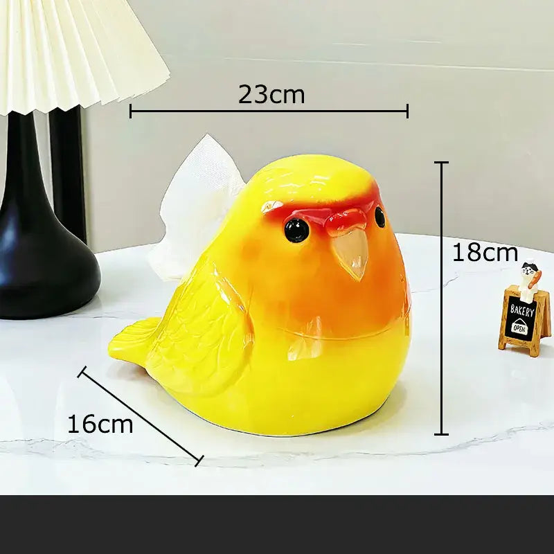 Glossy yellow and orange ceramic cartoon parrot tissue box with black eyes and red beak for living room decorbites decor