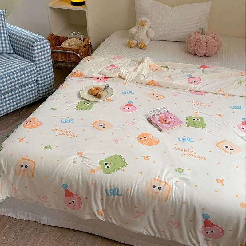 White duvet cover featuring decorbites cartoon patchwork with playful cookie and pastel characters for summer comfort