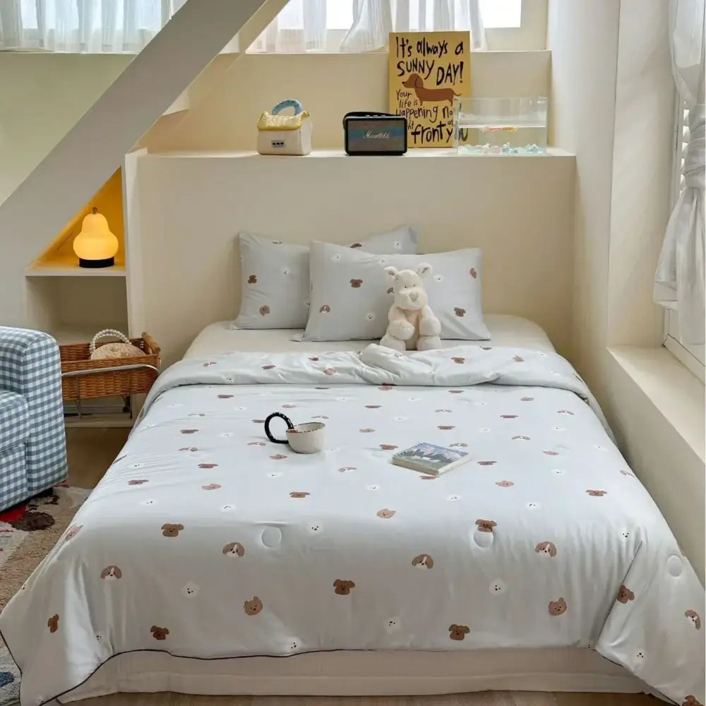 Light blue and white quilted duvet cover with embroidered brown puppy faces decorbites cartoon patchwork summer blanket