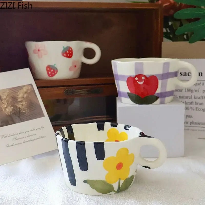 White ceramic cartoon pattern ceramic coffee mug with bold black stripes and hand-painted yellow floral decorbites design