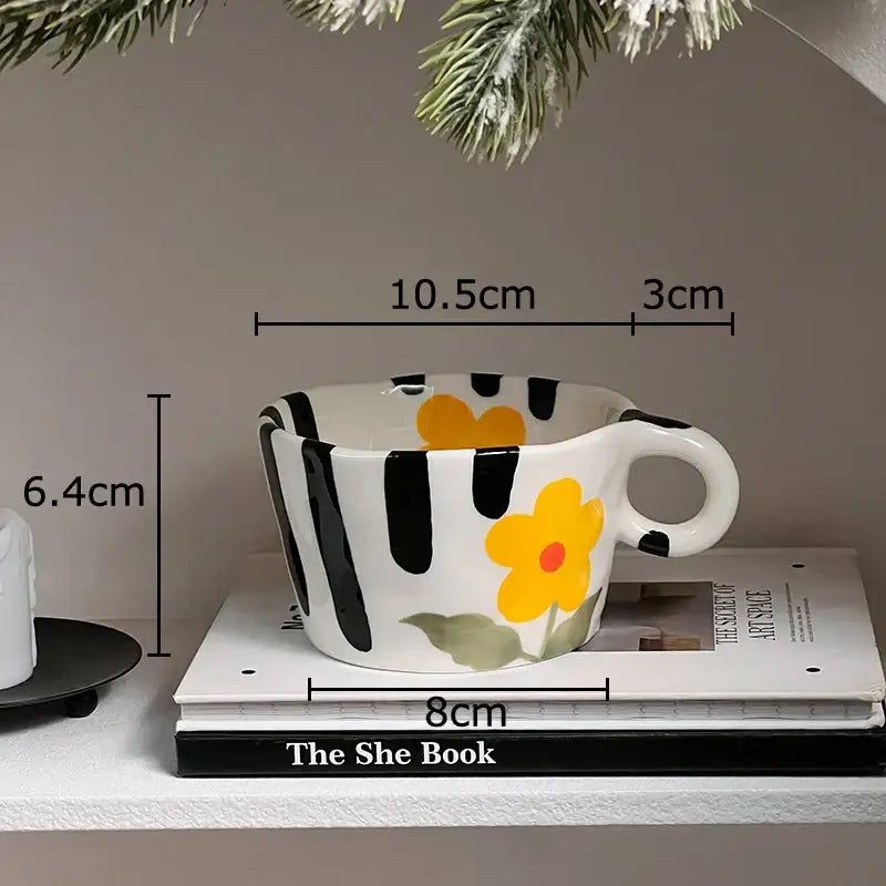 White ceramic mug from decorbites cartoon pattern ceramic mug set with black stripes and yellow flower design