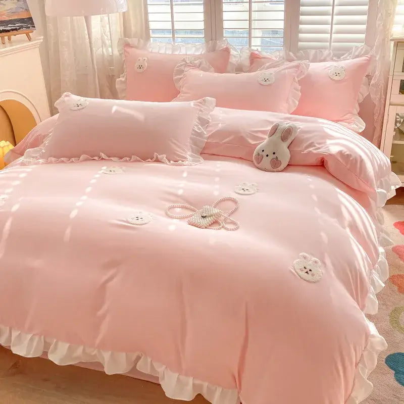 Pink ruffled bedding set with embroidered white bunny appliqués and lace trim for decorbites cartoon princess bedroom