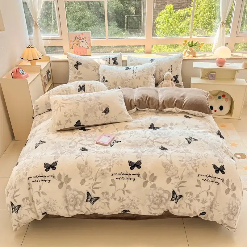 Cream-colored quilt bedding set with butterfly floral pattern and cursive text in soft gray tones for decorbites cartoon print