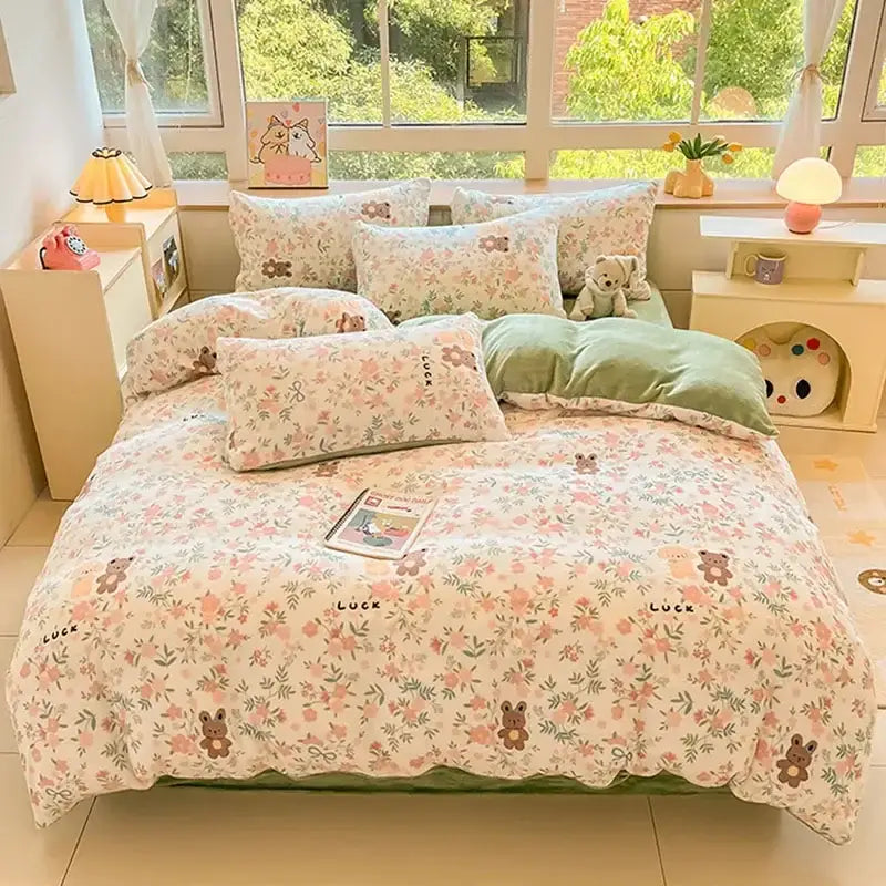 A soft pastel pink and green cotton bedding set with cartoon print embroidered teddy bears and luck script decorbites cartoon print