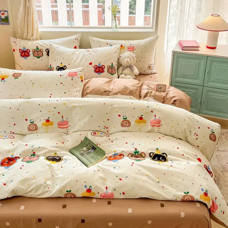 Cream-colored cartoon printed cotton duvet cover featuring playful bears and pastel dessert motifs by decorbites