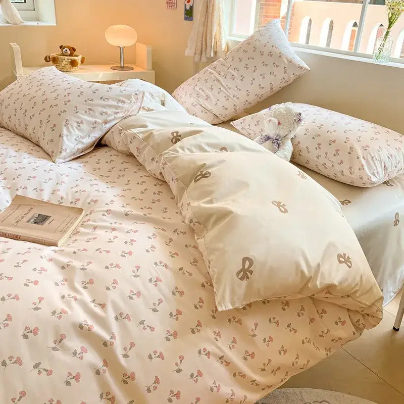 Cream-colored decorbites cartoon printed cotton duvet cover with delicate pink and green floral design and soft fabric finish