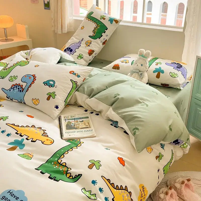 Cartoon printed cotton duvet cover featuring colorful cartoon dinosaurs on a white and light green cream base by decorbites