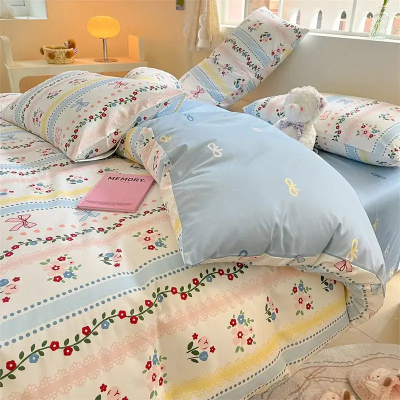 Pastel floral patterned cartoon printed cotton duvet cover with delicate ribbon accents in cream decorbites bedroom set
