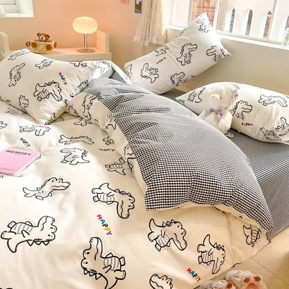 Cream duvet cover with decorbites cartoon printed cotton featuring white dinosaur design and black checkered pillowcase