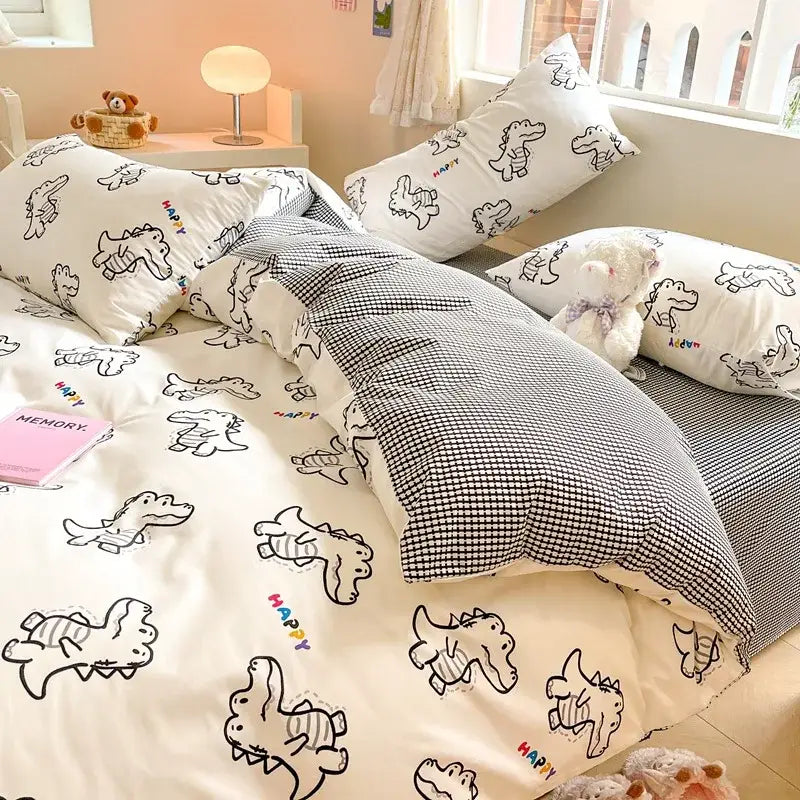 Cream duvet cover with decorbites cartoon printed cotton featuring white dinosaur design and black checkered pillowcase