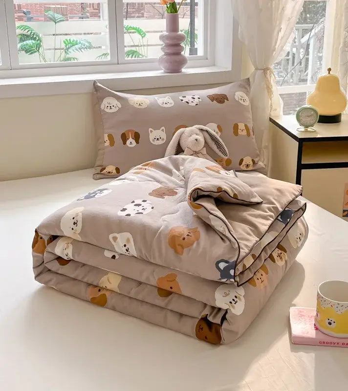 A cozy beige cooling blanket with colorful cartoon dogs pattern from decorbites cartoon printed summer quilt collection