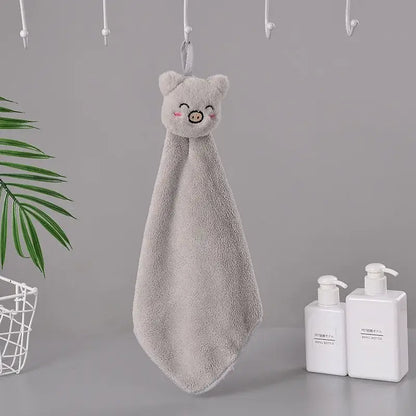 A soft gray coral fleece hand towel with a cartoon pig face design for quick dry bathroom use by decorbites cartoon rabbit