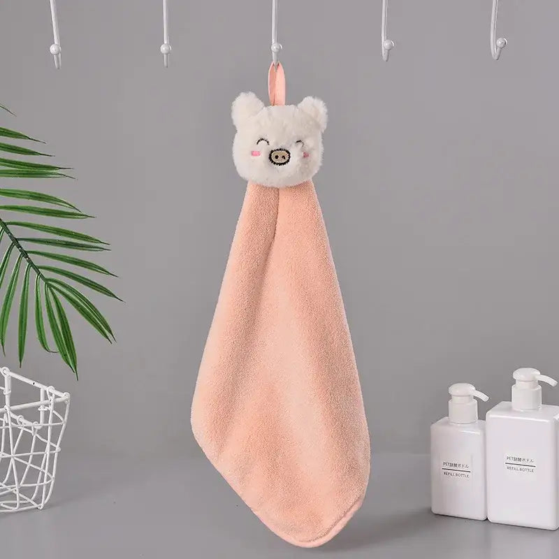 A soft peach coral fleece hand towel with a cute white pig face charm for bathroom quick dry decorbites cartoon rabbit